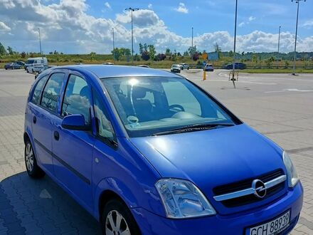 Опель Мерива 2004 в Европе на Automoto.ua Синий Опель Мерива, объемом двигателя 1.36 л и пробегом 257000 тыс. км за 6300 $, фото 1 на Automoto.ua