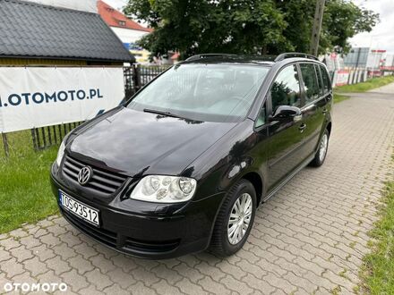 Фольксваген Туран 2004 в Европе на Automoto.ua Черный Фольксваген Туран, объемом двигателя 1 л и пробегом 225 тыс. км за 2640 $, фото 1 на Automoto.ua