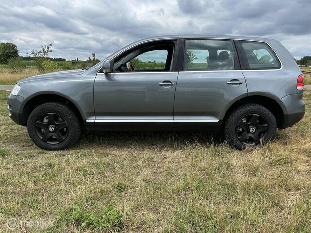 Фольксваген Туарег 2004 у Європі на Automoto.ua Сірий Фольксваген Туарег, об'ємом двигуна 3.19 л та пробігом 282 тис. км за 4113 $, фото 6 на Automoto.ua