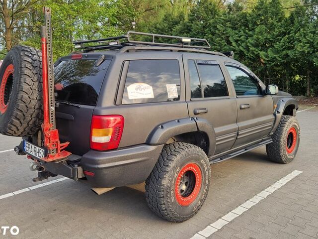 Джип Grand Cherokee, об'ємом двигуна 4.7 л та пробігом 240 тис. км за 14903 $, фото 4 на Automoto.ua