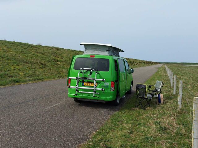 Зелений Ніссан NV200, об'ємом двигуна 2 л та пробігом 142 тис. км за 13978 $, фото 4 на Automoto.ua