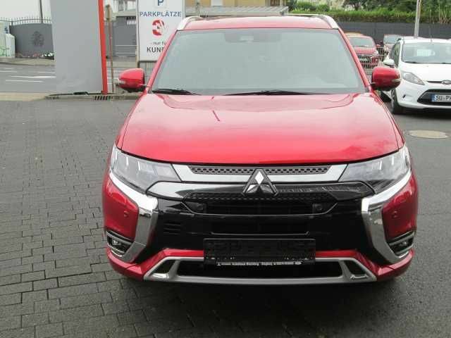 Красный Мицубиси Outlander PHEV, объемом двигателя 2.36 л и пробегом 91 тыс. км за 29528 $, фото 1 на Automoto.ua