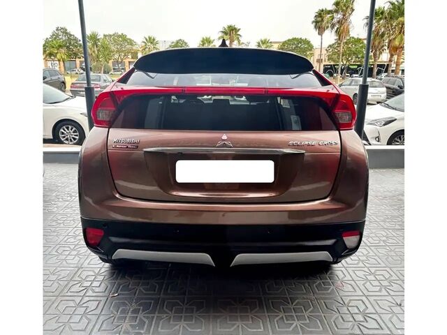 Міцубісі Eclipse Cross 2018 у Європі на Automoto.ua Коричневий Міцубісі Eclipse Cross, об'ємом двигуна 1.5 л та пробігом 112 тис. км за 19579 $, фото 3 на Automoto.ua