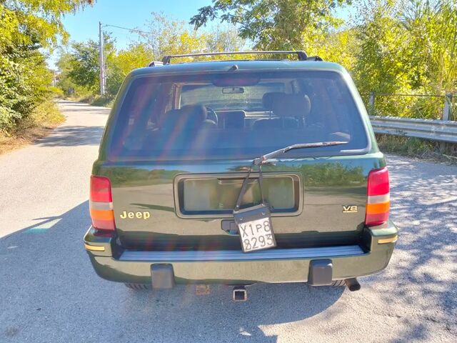 Джип Гранд Чероки 1995 в Европе на Automoto.ua Зеленый Джип Гранд Чероки, объемом двигателя 5.22 л и пробегом 187 тыс. км за 9342 $, фото 5 на Automoto.ua