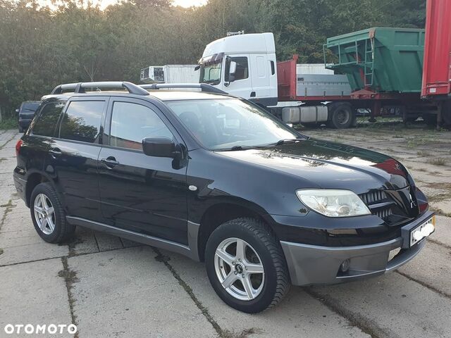 Мицубиси Аутлендер 2005 в Европе на Automoto.ua Черный Мицубиси Аутлендер, объемом двигателя 1 л и пробегом 227 тыс. км за 15900 $, фото 20 на Automoto.ua