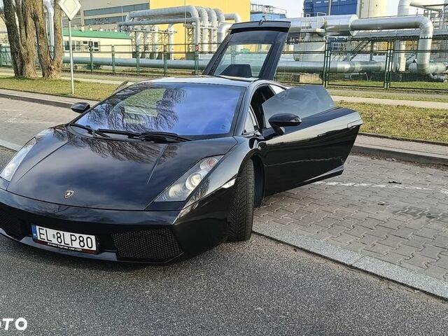 Ламборджини Галлардо 2006 в Европе на Automoto.ua Черный Ламборджини Галлардо, объемом двигателя 4.96 л и пробегом 119 тыс. км за 399000 $, фото 30 на Automoto.ua