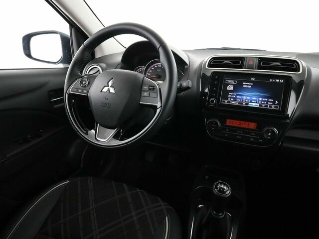 Мицубиси Спейс Стар 2023 в Европе на Automoto.ua Синий Мицубиси Спейс Стар, объемом двигателя 1.19 л и пробегом 40 тыс. км за 15695 $, фото 13 на Automoto.ua
