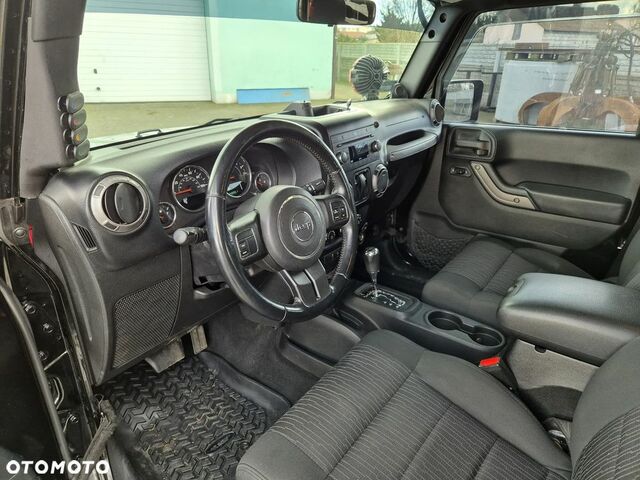 Джип Wrangler, об'ємом двигуна 3.61 л та пробігом 140 тис. км за 19438 $, фото 15 на Automoto.ua