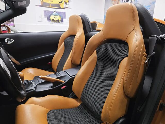 Ниссан 350З 2005 в Европе на Automoto.ua Оранжевый Ниссан 350З, объемом двигателя 3.5 л и пробегом 120 тыс. км за 25589 $, фото 6 на Automoto.ua