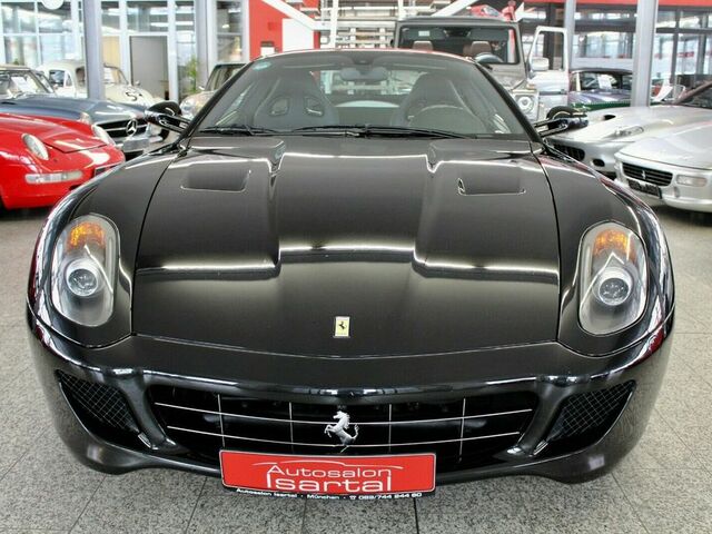 Черный Феррари 599 GTB, объемом двигателя 6 л и пробегом 45 тыс. км за 151466 $, фото 1 на Automoto.ua