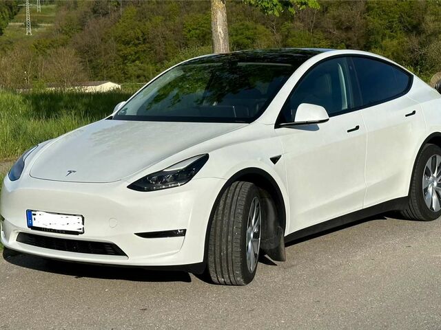 Білий Тесла Model Y, об'ємом двигуна 0 л та пробігом 19 тис. км за 49568 $, фото 1 на Automoto.ua