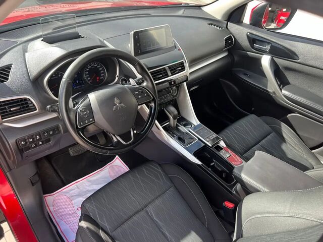 Мицубиси Eclipse Cross 2019 в Европе на Automoto.ua Красный Мицубиси Eclipse Cross, объемом двигателя 1.5 л и пробегом 91 тыс. км за 17995 $, фото 6 на Automoto.ua