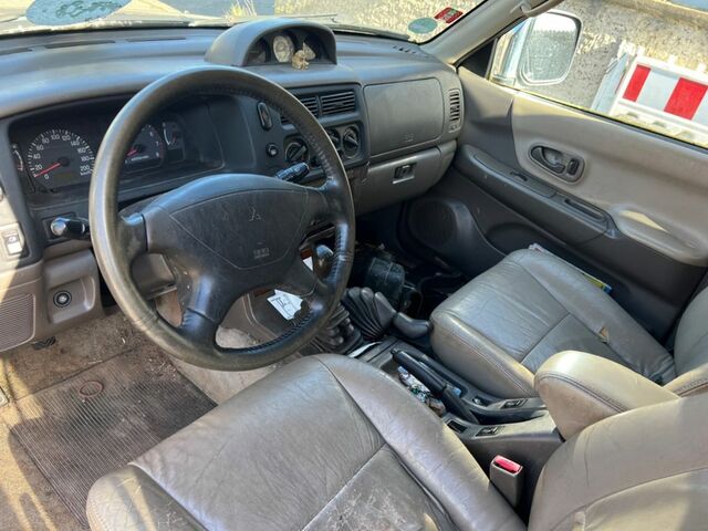 Міцубісі Паджеро 1999 у Європі на Automoto.ua Синій Міцубісі Паджеро, об'ємом двигуна 2.97 л та пробігом 250 тис. км за 1750 $, фото 8 на Automoto.ua