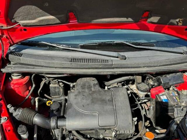 Красный Субару Джасти, объемом двигателя 1 л и пробегом 202 тыс. км за 1620 $, фото 3 на Automoto.ua