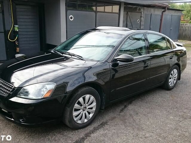 Ніссан Альтіма 2006 у Європі на Automoto.ua Чорний Ніссан Альтіма, об'ємом двигуна 2.49 л та пробігом 165 тис. км за 2640 $, фото 12 на Automoto.ua