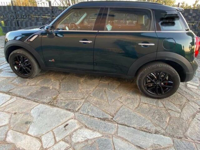 Зелений Міні Cooper Countryman, об'ємом двигуна 2 л та пробігом 169 тис. км за 9674 $, фото 1 на Automoto.ua