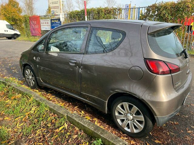 Міцубісі Кольт 2013 у Європі на Automoto.ua Коричневий Міцубісі Кольт, об'ємом двигуна 0 л та пробігом 67 тис. км за 1700 $, фото 6 на Automoto.ua