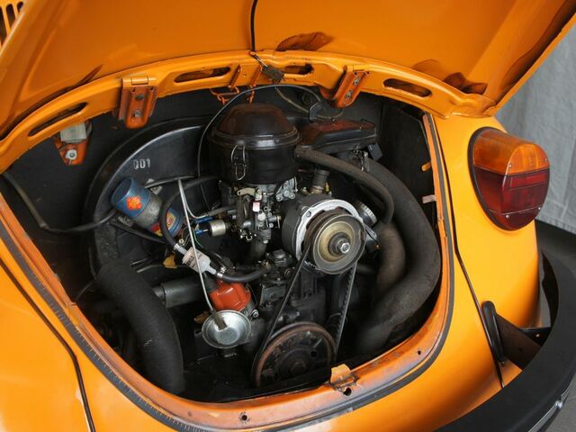 Помаранчевий Фольксваген Кафер, об'ємом двигуна 1.19 л та пробігом 82 тис. км за 9889 $, фото 4 на Automoto.ua