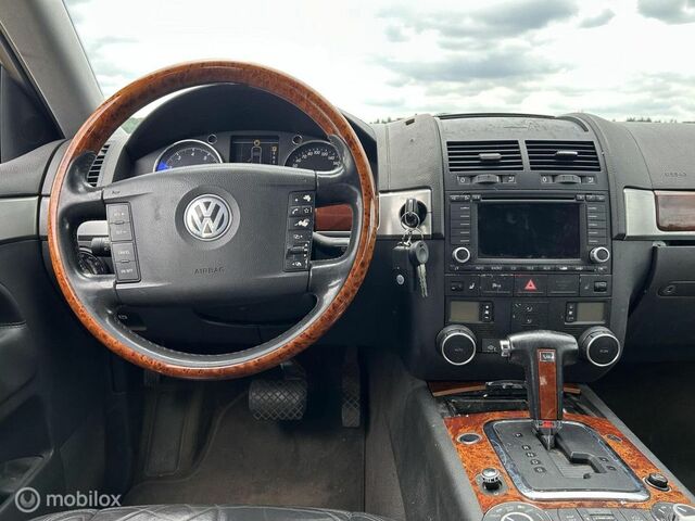 Фольксваген Туарег 2004 у Європі на Automoto.ua Сірий Фольксваген Туарег, об'ємом двигуна 3.19 л та пробігом 282 тис. км за 4113 $, фото 4 на Automoto.ua