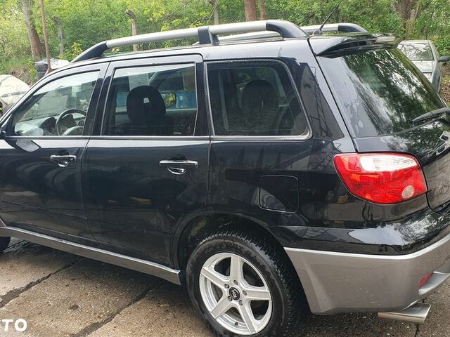Мицубиси Аутлендер 2005 в Европе на Automoto.ua Черный Мицубиси Аутлендер, объемом двигателя 1 л и пробегом 227 тыс. км за 15900 $, фото 29 на Automoto.ua