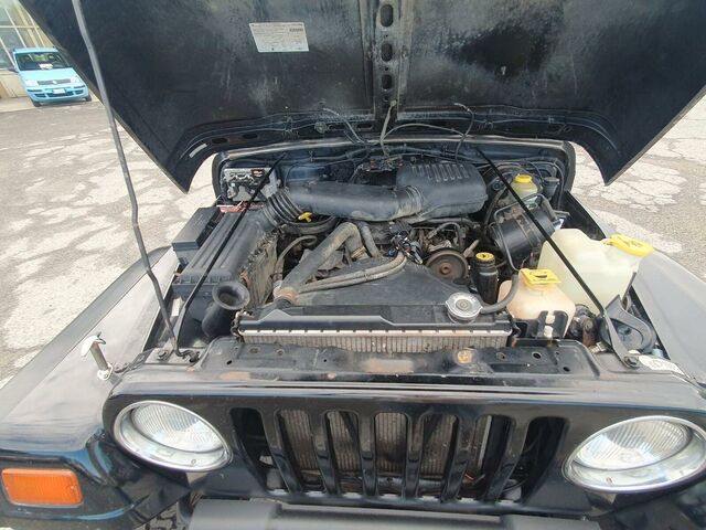 Джип Вранглер 1998 в Европе на Automoto.ua Черный Джип Вранглер, объемом двигателя 2.46 л и пробегом 156 тыс. км за 14900 $, фото 14 на Automoto.ua