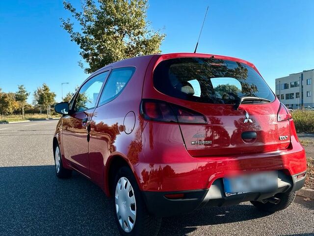 Мицубиси Кольт 2009 в Европе на Automoto.ua Красный Мицубиси Кольт, объемом двигателя 0 л и пробегом 40 тыс. км за 3399 $, фото 2 на Automoto.ua