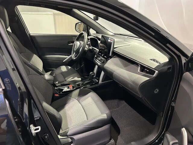 Тойота Corolla Cross 2024 у Європі на Automoto.ua Чорний Тойота Corolla Cross, об'ємом двигуна 1.99 л та пробігом 54 тис. км за 38341 $, фото 5 на Automoto.ua