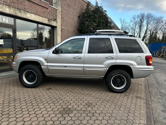 Сірий Джип Grand Cherokee, об'ємом двигуна 4.7 л та пробігом 200 тис. км за 11985 $, фото 7 на Automoto.ua