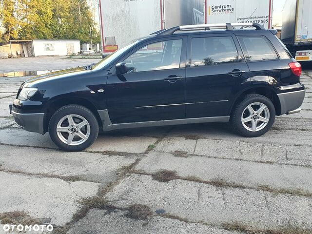 Мицубиси Аутлендер 2005 в Европе на Automoto.ua Черный Мицубиси Аутлендер, объемом двигателя 1 л и пробегом 227 тыс. км за 15900 $, фото 18 на Automoto.ua