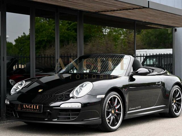 Черный Порше 911, объемом двигателя 3.8 л и пробегом 77 тыс. км за 106395 $, фото 1 на Automoto.ua