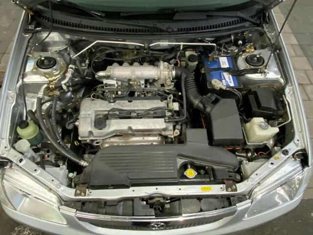 Сірий Мазда 323, об'ємом двигуна 1.49 л та пробігом 185 тис. км за 1583 $, фото 14 на Automoto.ua