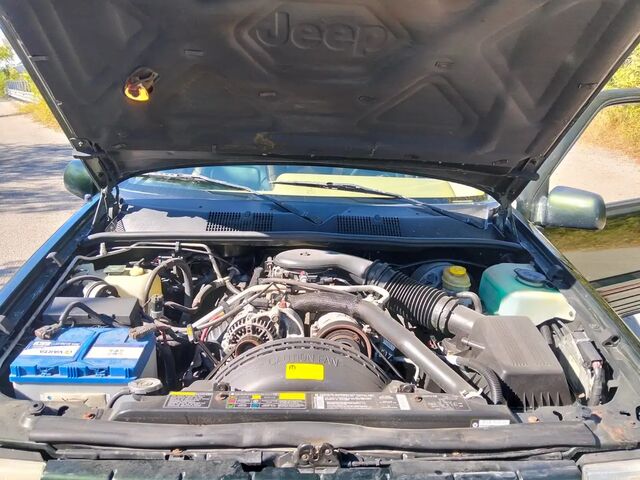 Джип Гранд Чероки 1995 в Европе на Automoto.ua Зеленый Джип Гранд Чероки, объемом двигателя 5.22 л и пробегом 187 тыс. км за 9342 $, фото 12 на Automoto.ua