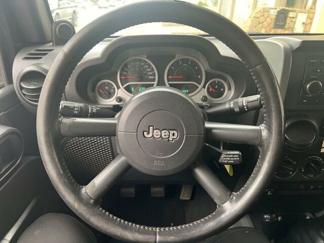 Джип Вранглер 2007 в Европе на Automoto.ua Синий Джип Вранглер, объемом двигателя 2.78 л и пробегом 290 тыс. км за 15500 $, фото 13 на Automoto.ua