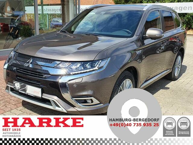 Коричневий Міцубісі Outlander PHEV, об'ємом двигуна 2.36 л та пробігом 40 тис. км за 31379 $, фото 1 на Automoto.ua