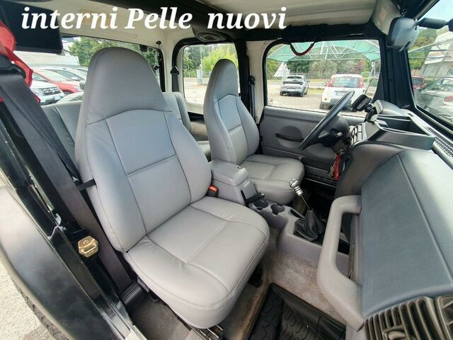 Джип Вранглер 1998 в Европе на Automoto.ua Черный Джип Вранглер, объемом двигателя 2.46 л и пробегом 156 тыс. км за 14900 $, фото 6 на Automoto.ua