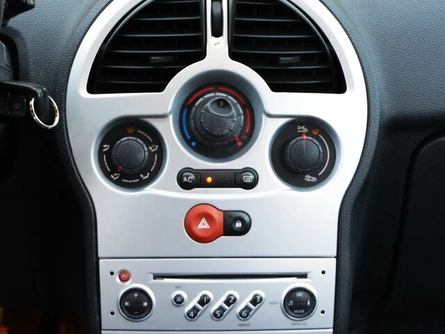 Рено Модус 2009 в Европе на Automoto.ua Белый Рено Модус, объемом двигателя 1 л и пробегом 171 тыс. км за 12800 $, фото 39 на Automoto.ua