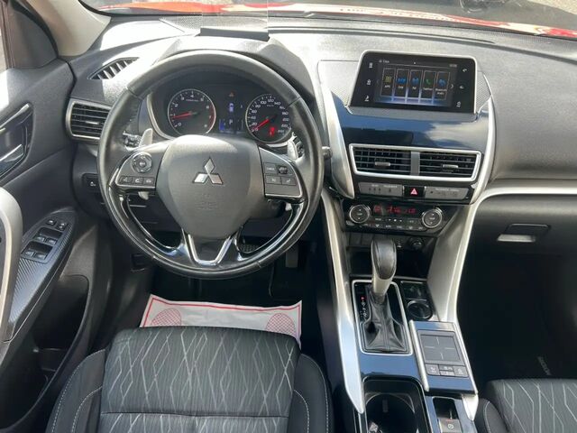 Мицубиси Eclipse Cross 2019 в Европе на Automoto.ua Красный Мицубиси Eclipse Cross, объемом двигателя 1.5 л и пробегом 91 тыс. км за 17995 $, фото 9 на Automoto.ua