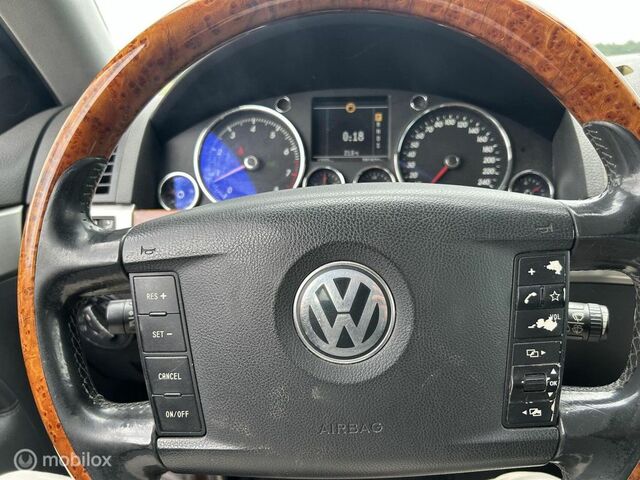 Фольксваген Туарег 2004 у Європі на Automoto.ua Сірий Фольксваген Туарег, об'ємом двигуна 3.19 л та пробігом 282 тис. км за 4113 $, фото 13 на Automoto.ua