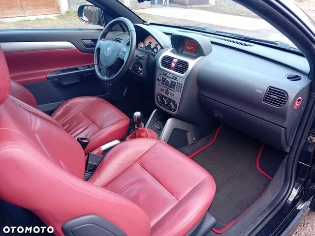Опель Тигра 2008 в Европе на Automoto.ua Черный Опель Тигра, объемом двигателя 1 л и пробегом 226 тыс. км за 17500 $, фото 11 на Automoto.ua