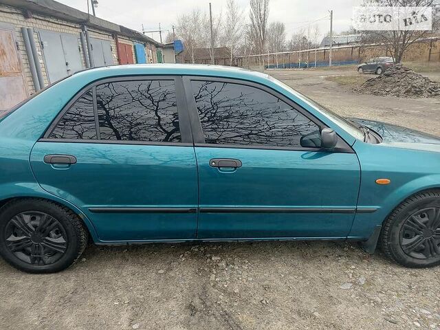 Мазда 323, Седан 1994 - 1998 S V 1.7 TD