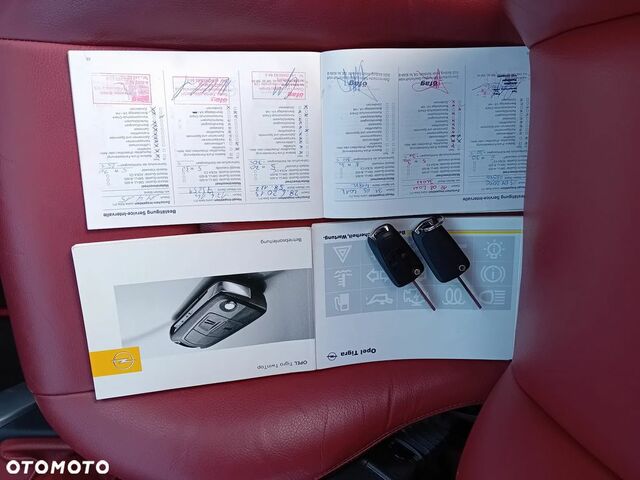 Опель Тигра 2008 в Европе на Automoto.ua Черный Опель Тигра, объемом двигателя 1 л и пробегом 226 тыс. км за 17500 $, фото 16 на Automoto.ua
