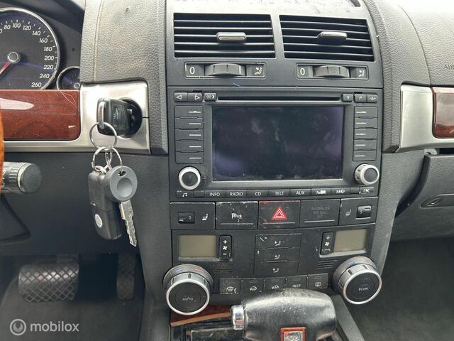 Фольксваген Туарег 2004 у Європі на Automoto.ua Сірий Фольксваген Туарег, об'ємом двигуна 3.19 л та пробігом 282 тис. км за 4113 $, фото 5 на Automoto.ua