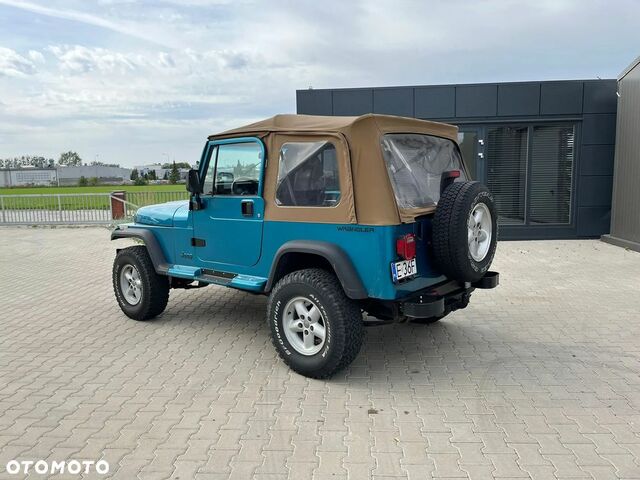 Джип Wrangler, об'ємом двигуна 3.96 л та пробігом 152 тис. км за 13974 $, фото 2 на Automoto.ua