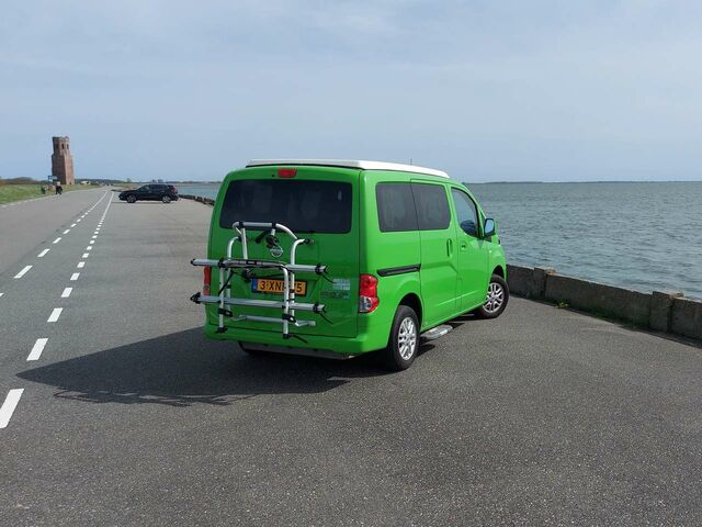 Зелений Ніссан NV200, об'ємом двигуна 2 л та пробігом 142 тис. км за 13978 $, фото 1 на Automoto.ua