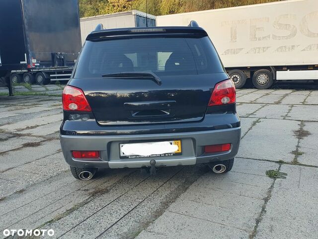 Мицубиси Аутлендер 2005 в Европе на Automoto.ua Черный Мицубиси Аутлендер, объемом двигателя 1 л и пробегом 227 тыс. км за 15900 $, фото 7 на Automoto.ua