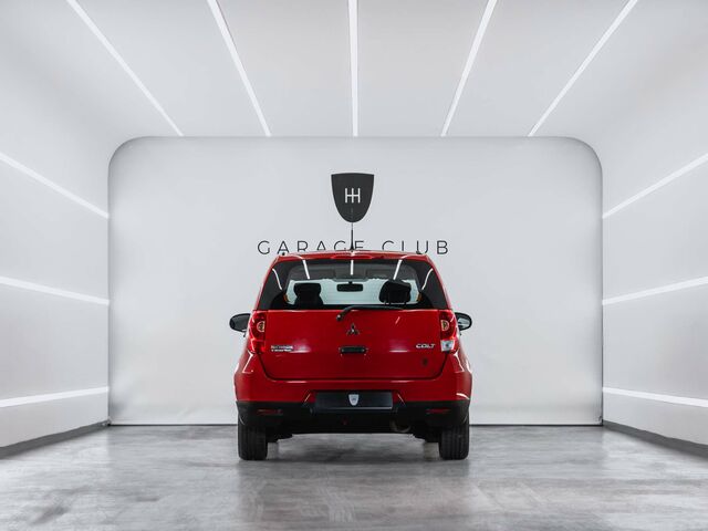 Мицубиси Кольт 2010 в Европе на Automoto.ua Красный Мицубиси Кольт, объемом двигателя 1.12 л и пробегом 66 тыс. км за 6982 $, фото 3 на Automoto.ua