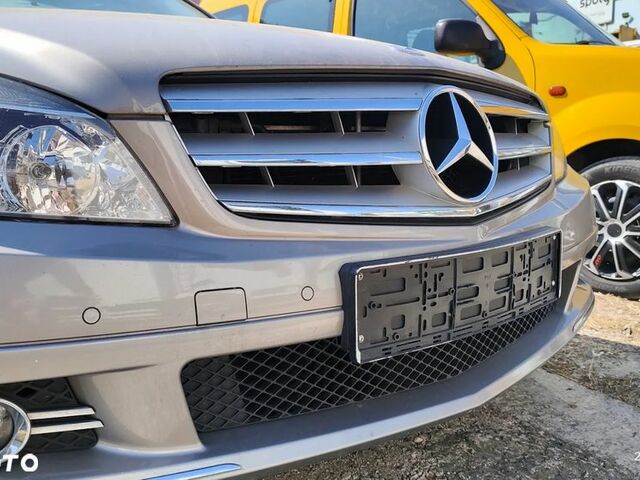 Мерседес Ц-Клас 2007 у Європі на Automoto.ua Сірий Мерседес Ц-Клас, об'ємом двигуна 1 л та пробігом 110 тис. км за 8451 $, фото 24 на Automoto.ua