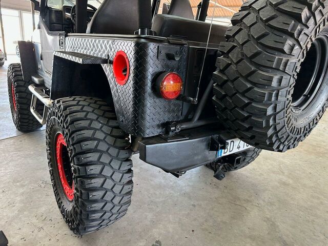 Джип Wrangler 1999 у Європі на Automoto.ua Чорний Джип Wrangler, об'ємом двигуна 3.96 л та пробігом 150 тис. км за 24900 $, фото 14 на Automoto.ua