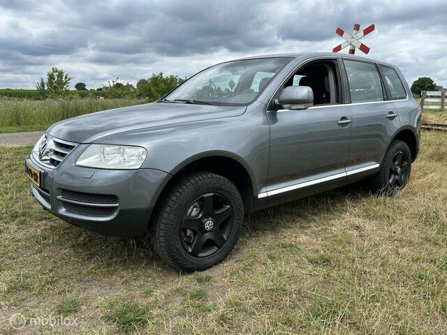 Фольксваген Туарег 2004 у Європі на Automoto.ua Сірий Фольксваген Туарег, об'ємом двигуна 3.19 л та пробігом 282 тис. км за 4113 $, фото 14 на Automoto.ua