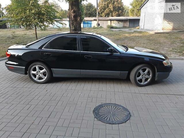 Мазда Милления, Седан 1997 - н.в. (TA221) 2.3 i V6 24V